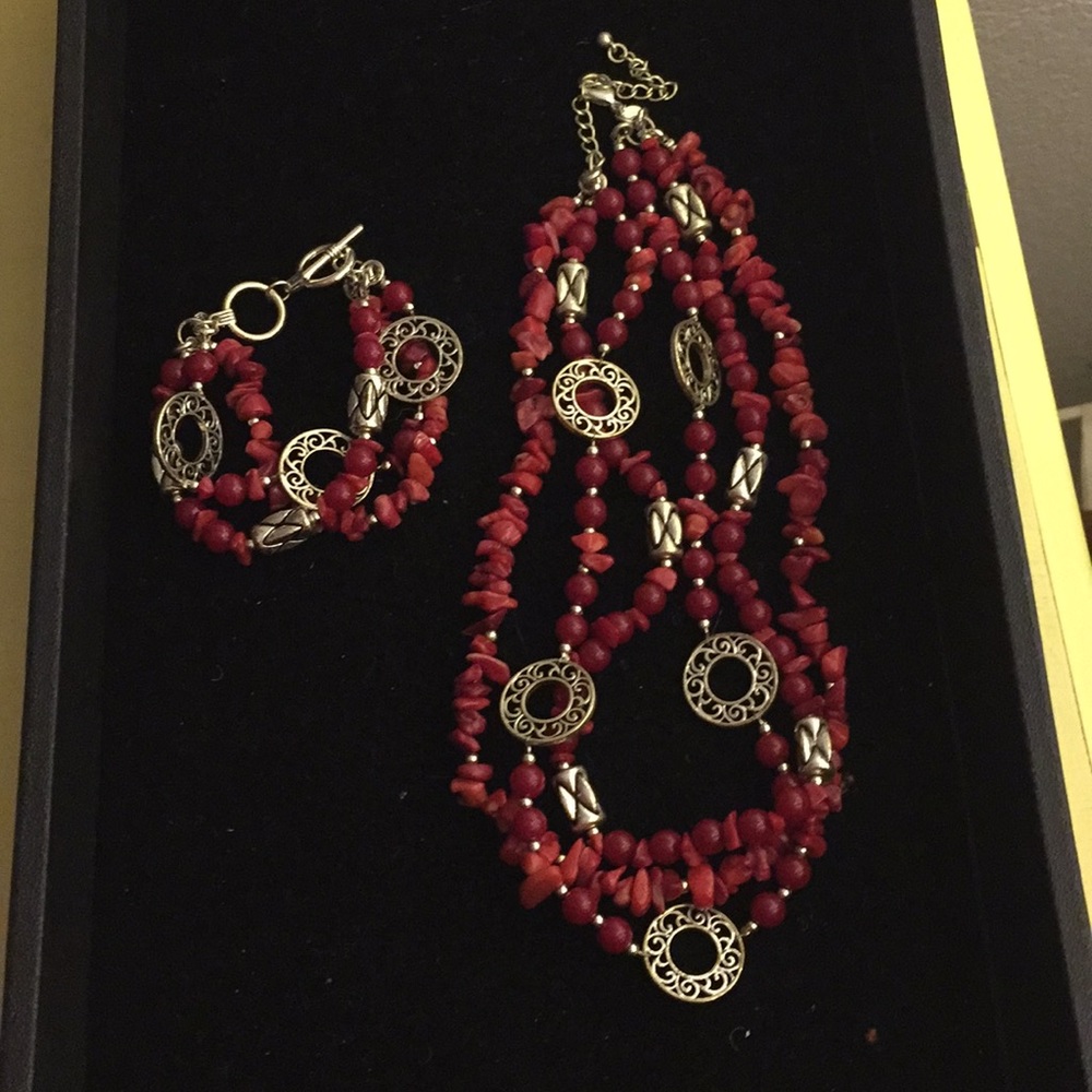 3 layered red necklace with matching bracelet.